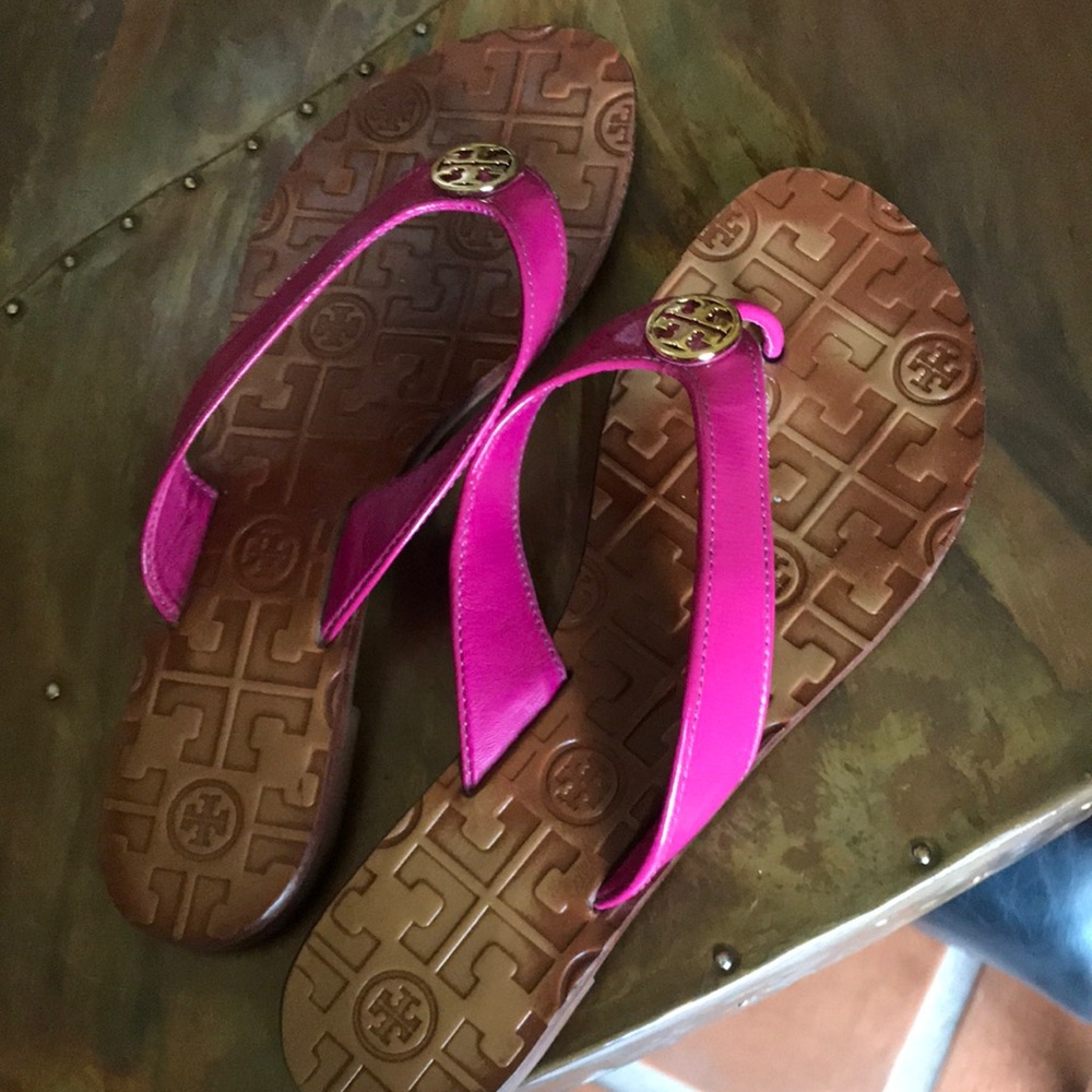 Hot pink Tory Burch sandals.